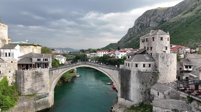 Cinematic aerial view of Stari Most (Old Bridge) in Mostar, Bosnia and Herzegovina.