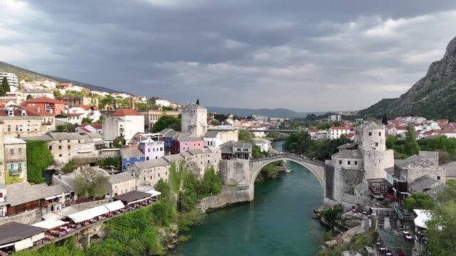 Cinematic aerial view of Stari Most (Old Bridge) in Mostar, Bosnia and Herzegovina.