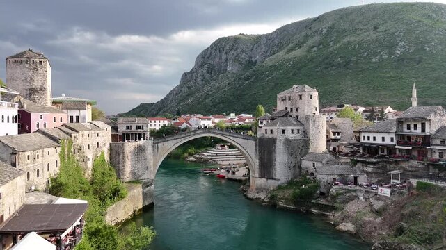 Cinematic aerial view of Stari Most (Old Bridge) in Mostar, Bosnia and Herzegovina.