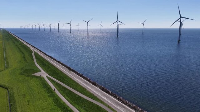 WindTurbines in a very blue sea on a beautiful sunny day