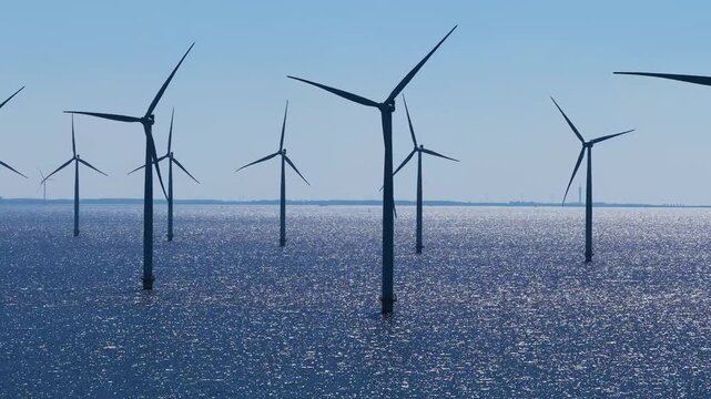 WindTurbines in a very blue sea on a beautiful sunny day
