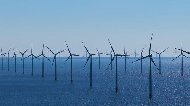 WindTurbines in a very blue sea on a beautiful sunny day