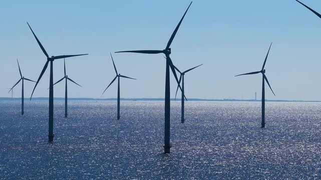 WindTurbines in a very blue sea on a beautiful sunny day