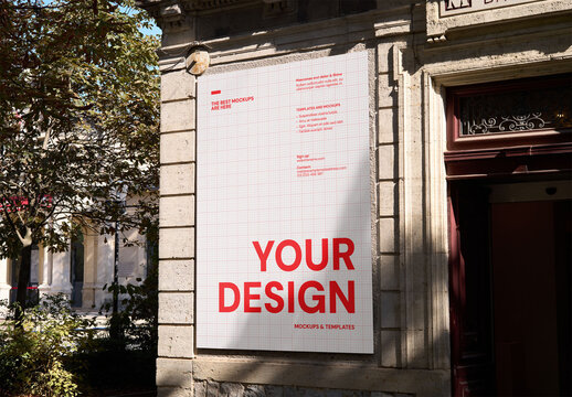 Mockup Of Customized Vertical Poster On Building