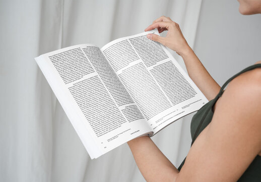 Mockup Of Woman Reading Customized Magazine