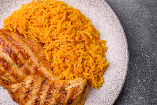 Dajaj Mashwi, an Arabic dish with rice and chicken, salt, and spices. Dajaj Mashwi as a background