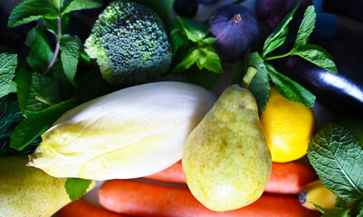 Fresh organic harvest with vegetables, berries and figs for grocery promotions and healthy eating advertisements © Євгенія Мартиненко