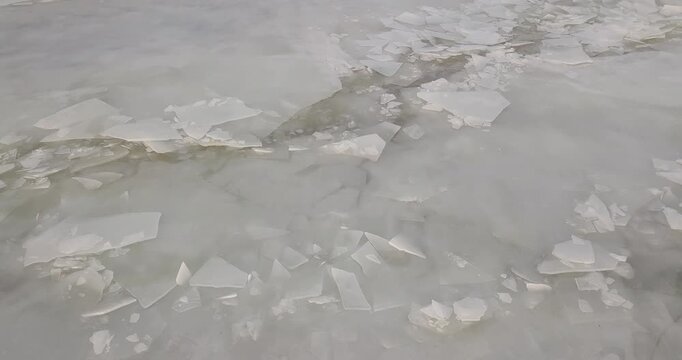 Large frozen river drone flight, lots of ice on the river