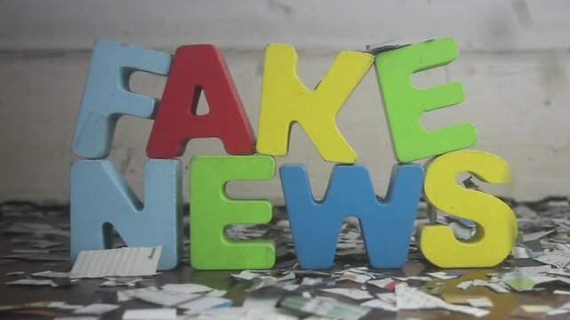FAKE NEWS with wooden letters 