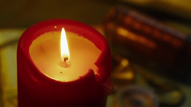 Cinematic slide over candlelight reveals a cryptex and compass, building intrigue around hidden messages and coded secrets.Escape room and story telling concepts