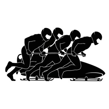 Four person bobsled team pushing sled for start.