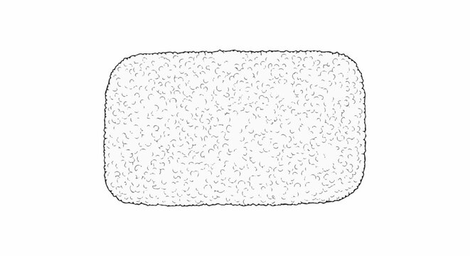 A white, rectangular sponge-like object with a textured surface