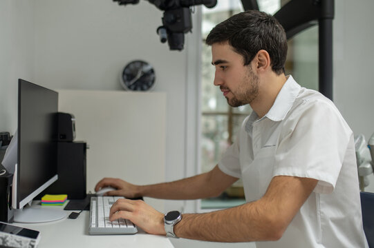 Dentist working at computer