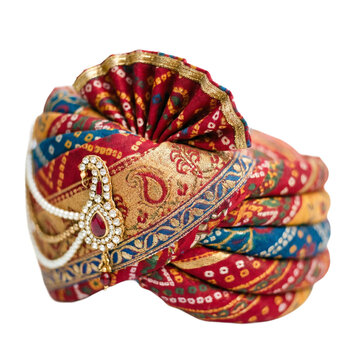 Traditional Indian wedding turban with jewelry, royal Rajasthani safa for groom, ethnic pagri with bandhani print and pearl brooch isolated on Transparent Background