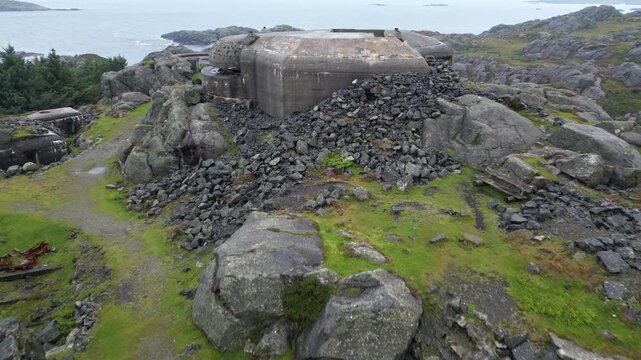 Aerial of a Bunker on Top of Hill Next To The Sea 4k drone