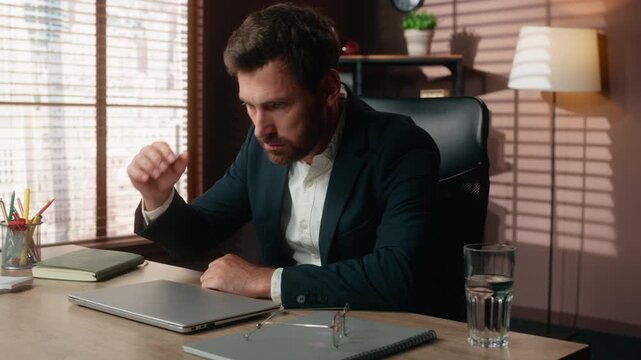 Angry Caucasian business man take off glasses close laptop yelling furious in office 40s businessman male executive taking off eyeglasses closing computer yell feel rage in company bankruptcy crash