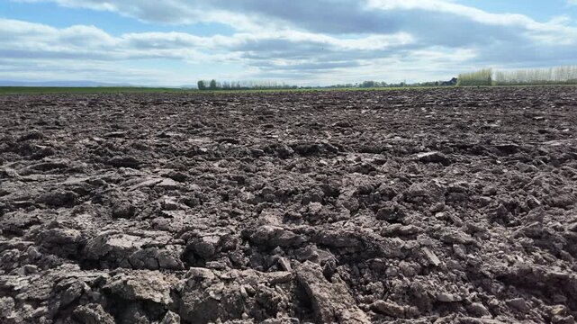 Freshly ploughed agricultural field in North west England in April.