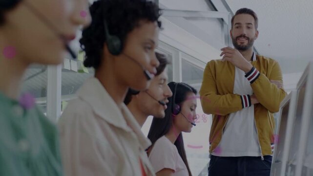 Vertical video: Lead walking up gesturing while watching business team on headset checking quality