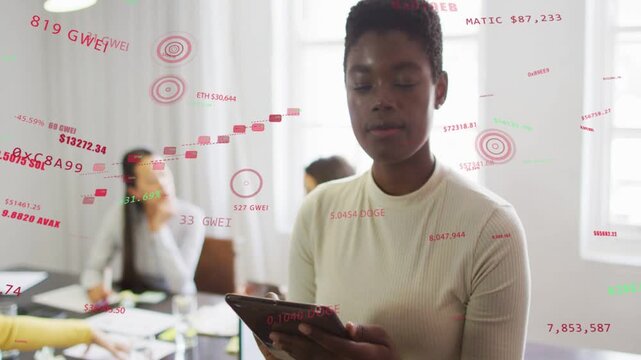 Woman leading tapping tablet causing AR crypto charts ETH GWEI showing for review while cam zooming