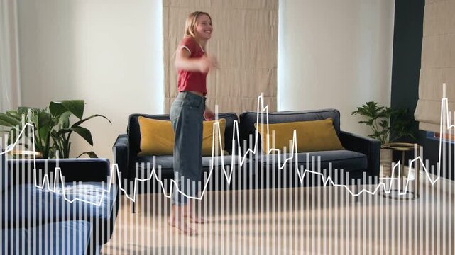 Woman walking into living room, pausing and dancing, responding to music beat with waveform syncing