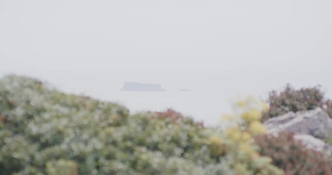 Hazy View of Filfla Island from Dingli Cliffs, Malta