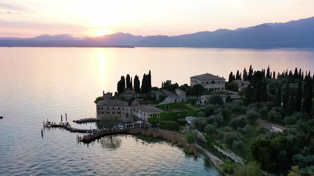 Punta San Vigilio, Garda Lake at sunset, aerial view. Italy