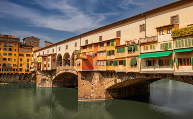 Naklejka premium Ponte Vecchio in Florence, the oldest stone bridge in Europe, rebuilt in its current form in 1345