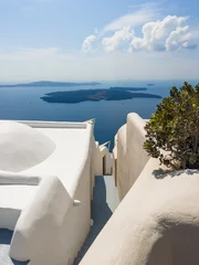 White architecture in Santorini island, Greece. Beautiful seascape at sunny day. Travel and summer vacation concept © smallredgirl