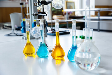 Colorful Chemistry Experiment in a Modern Laboratory Showcasing Various Test Tubes Filled With Vibrant Liquids © malyutinaanna