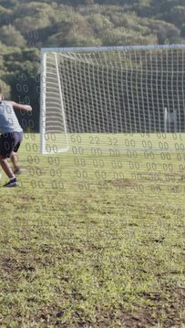 Vertical video: Striker entering dribbling ball to score, keeper diving, HUD showing sport play