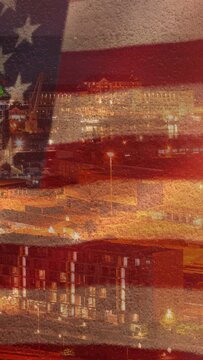 Vertical video: Fade-in showing American flag overlaying city, lights pulsing, evoking patriotism