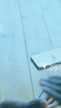 Vertical video: Social icons appearing, pair of hands reaching and clasping to show bond near phone