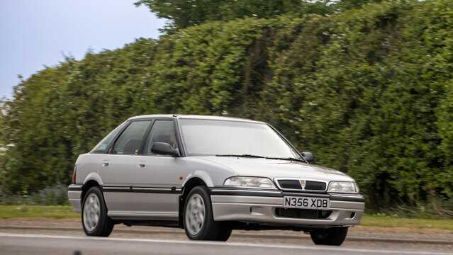 Bicester,Oxon.,UK - Apr 26th 2026:  1995 Rover 214 car driving on a British road