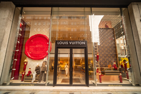 LONDON - Sloane Street Knightsbridge &ndash; Louis Vuitton luxury retail window display fashion store.