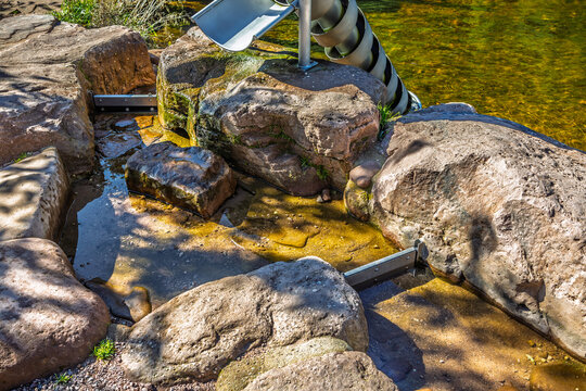 Natural water playground in a park for children