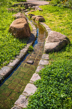 Natural water playground in a park for children