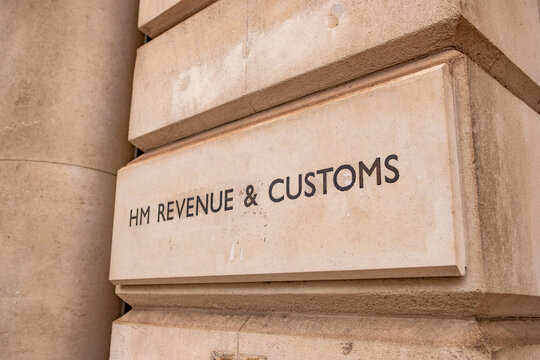 LONDON - HM Revenue & Customs stone sign Whitehall Parliament Street government building