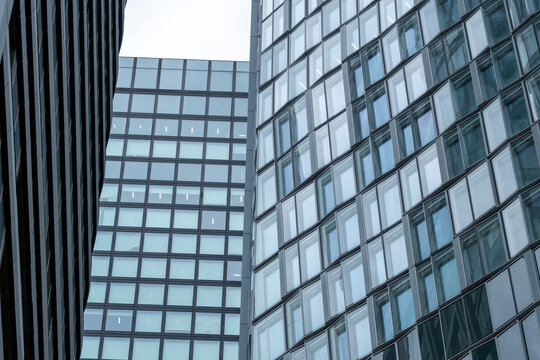 Modern facade architecture glass windows grid pattern office Bankenviertel Frankfurt corporate finance district exterior with clean geometry