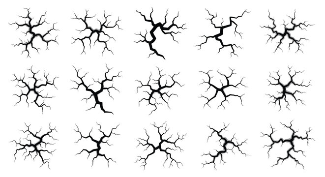 Collection of realistic black cracked ground or wall patterns showing various types of damage and fractures for design work.