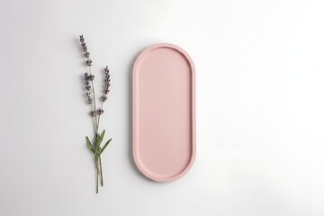 Fototapeta premium Pink plaster tray with lavender flower, pink plaster tray on white background for product mockup, minimalist pink plaster tray with copy space for jewelry and cosmetics presentation.