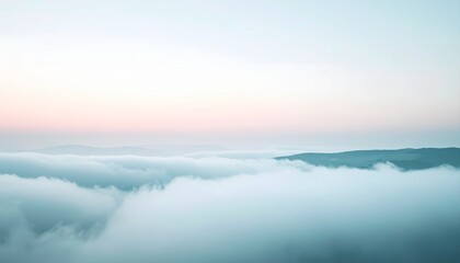 Fototapeta premium Ethereal landscape of clouds and sky at sunrise, a serene vista.