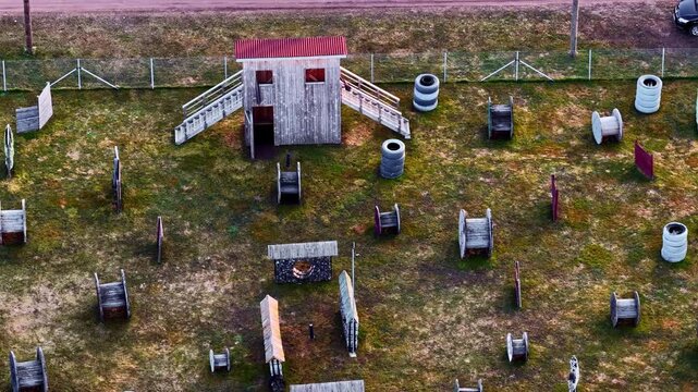 Paintball or laser tag gaming arena with bunkers and obstacles for adventure sport