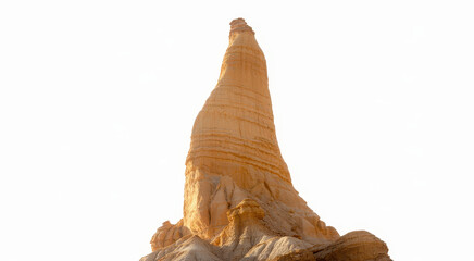 Obraz premium Eroded sandy desert spire isolated on a white background, for digital landscape, scene compositing