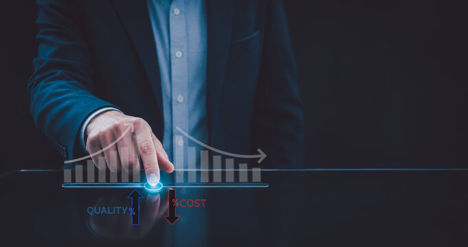 project management budgeting control. Businessman pointing at a transparent graph showing quality rising and cost decreasing in a business concept.