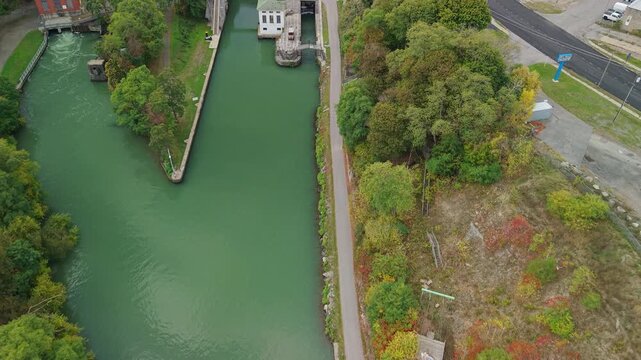 Lockport, New York, USA. Aerial view approaching historic Erie Canal locks where barges were raised and lowered through lock chambers with gates