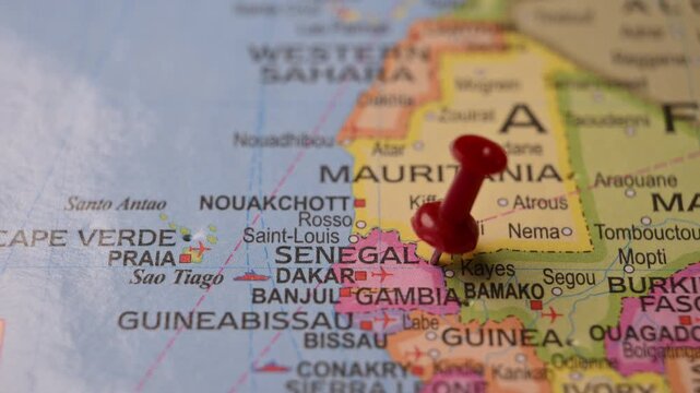 Hand Pointing Senegal with Red Pin on World Map 4K 60fps