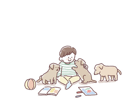 三匹の子犬と遊ぶ小さい男の子