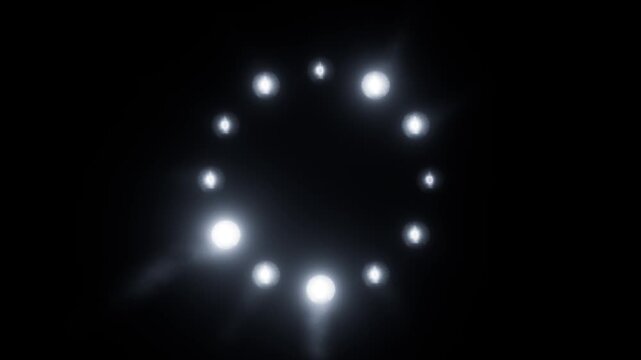Circle of flashing lights. Bright glowing spotlight animation. Illumination motion texture with pulse effect. Seamless loop.