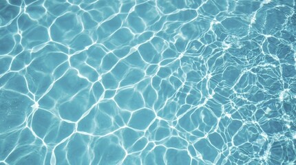 Fototapeta premium Swimming pool water surface with sun reflections and rippling waves