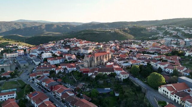 Drone flying towards freixo de espada a cinta church in portugal